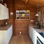 Log House In The First Row At The Sejero Bay *